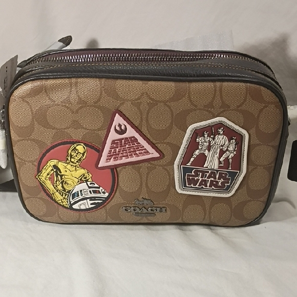 Coach Handbags - Coach Brown Signature Canvas Toiletry Pouch with Star Wars Patches